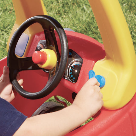 Cozy Coupe with Working Door, Horn & Removable Floorboard - 
Moving, clicking ignition switch for pretend startups.