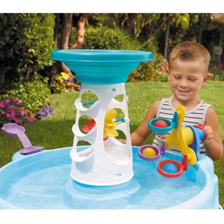 Spinning Seas Water Table™ - 
Turn the Ferris wheel to scoop up and drop off balls.