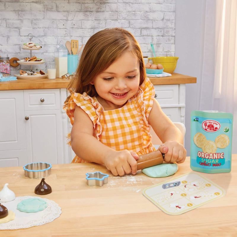 girl rolling out dough