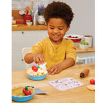 boy decorating the pie