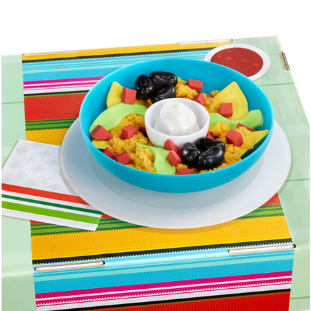 Creative Chefs™ Nachos Kit - 
Package becomes a play table. Kids can place their dishes on the table for the ultimate pretend play experience.