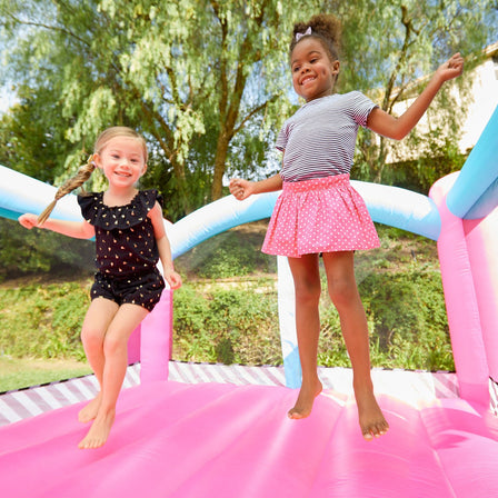 LOL Surprise™ Jump 'n Slide Bouncer™ - 
Tall walls with mesh netting surround a large jumping area.