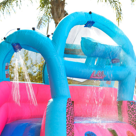 LOL Surprise™ River Race Water Slide - 
A surprise dump bucket pours water on kids.