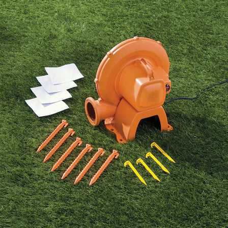 Slam 'n' Curve Slide - 
Includes: stakes to anchor bouncer; heavy-duty blower with GFCI plug with stakes; bouncer storage bag and repair kit.