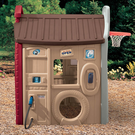 Endless Adventures® Tikes Town™ Playhouse - 
Gas Station Wall includes a gas pumper and a crawl through tire.