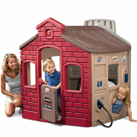 Endless Adventures® Tikes Town Playhouse - 
Playhouse has four different themed walls full of play features.