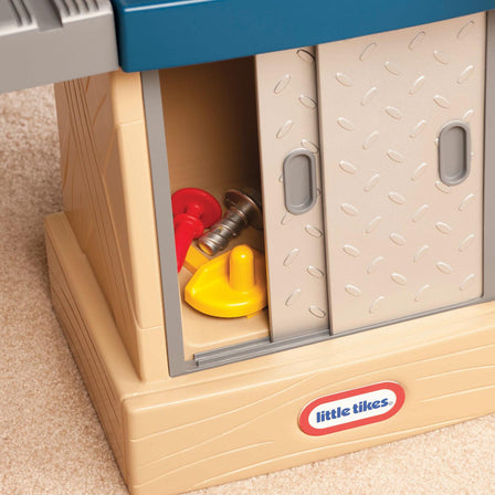 Tikes Tough™ Workshop - 
Additional storage space located behind the sliding doors.