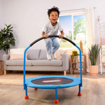 Boy jumping on trampoline