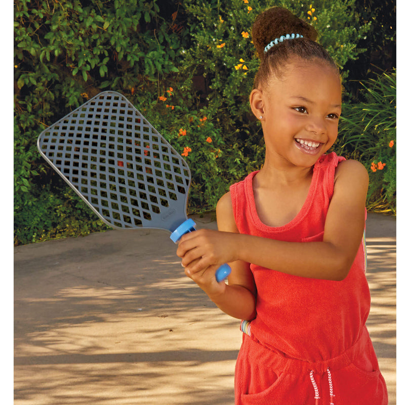 girl holding paddle