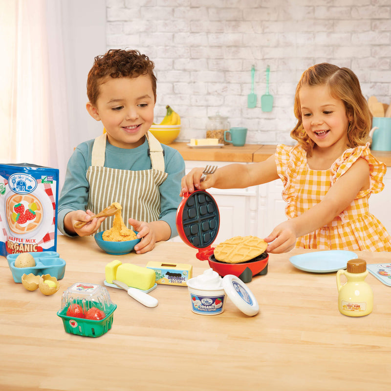 Kids making waffles