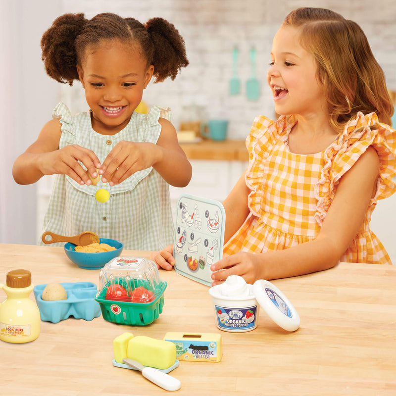 girl breaking an egg