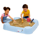 Boy and girl playing with sand