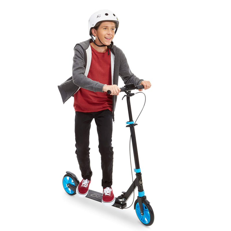 Boy riding scooter