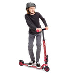 Boy riding scooter