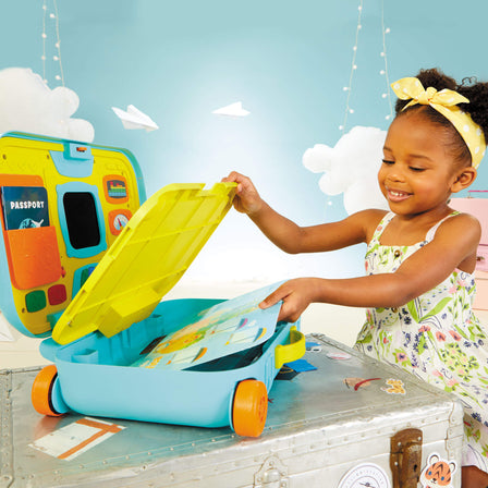 Learn & Play™ Learning Activity Suitcase - 
Lift the play panel to reveal large storage area to store maps, boarding pass, passport, dry erase marker, sticker sheet and more.