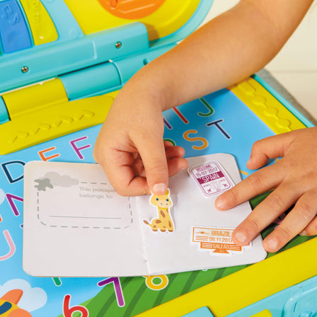 Learn & Play™ Learning Activity Suitcase - 
Passport and sticker sheet included so kids can customize it.