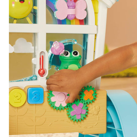 Learn & Play™ Look & Learn Window™ - 
Move and turn gears and knobs to develop fine motor skills.