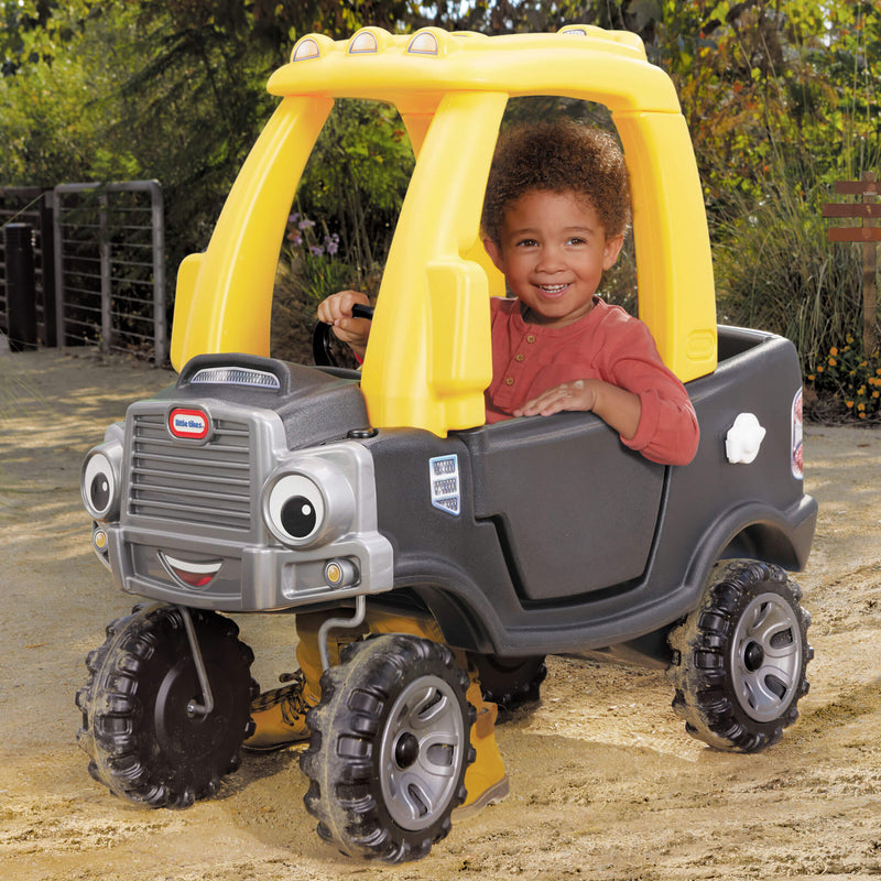 Boy riding in the Cozy Truck