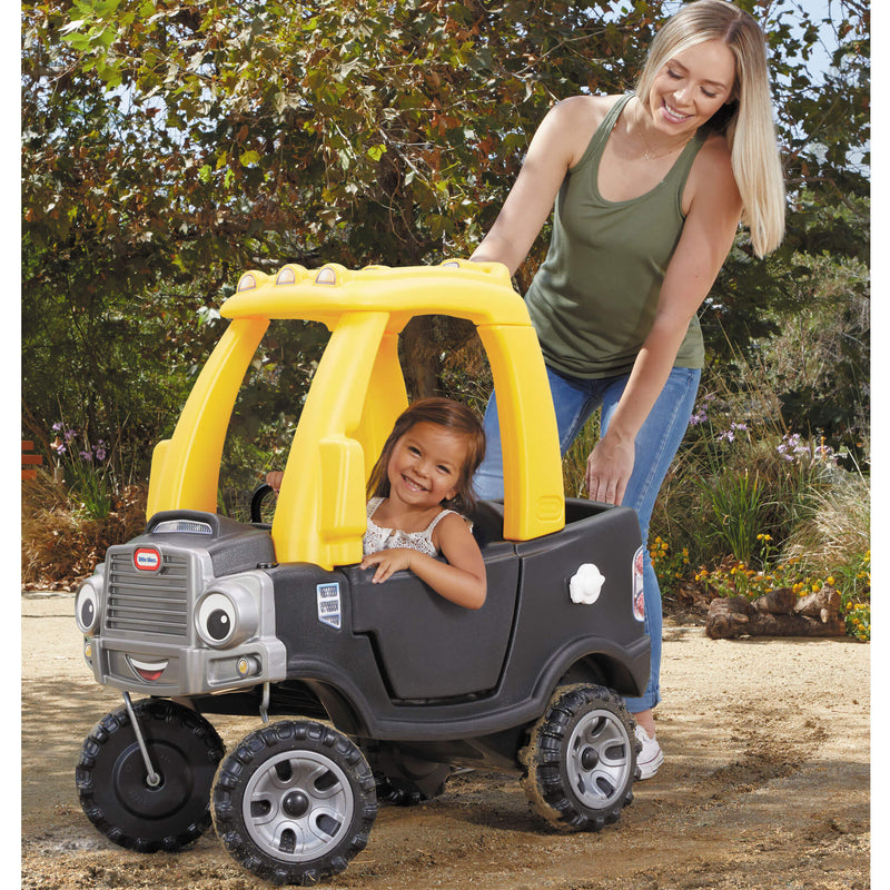 Parent pushing the Cozy Truck