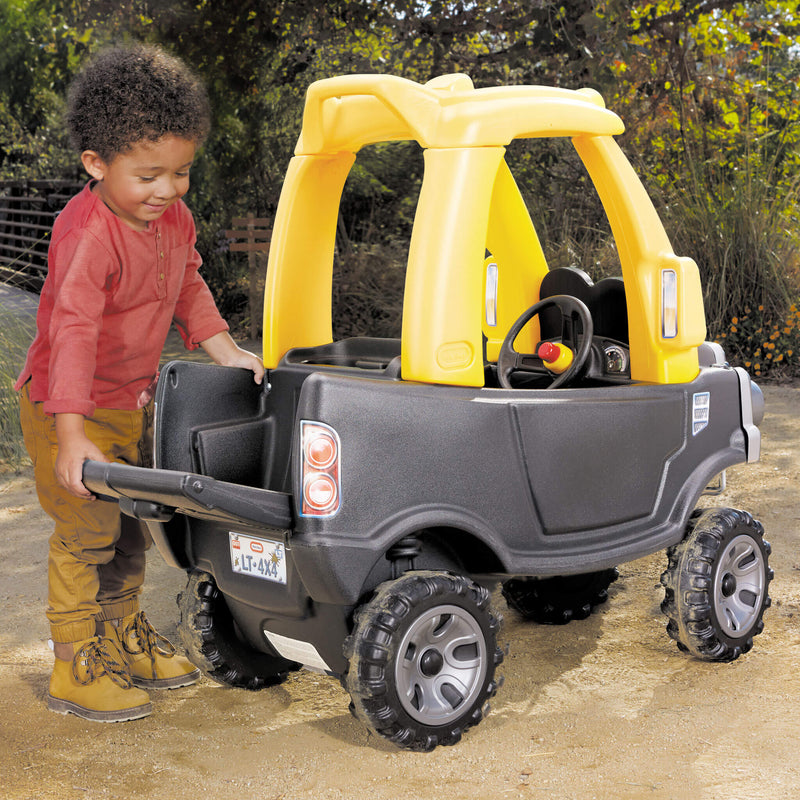 Boy using drop down tail gate