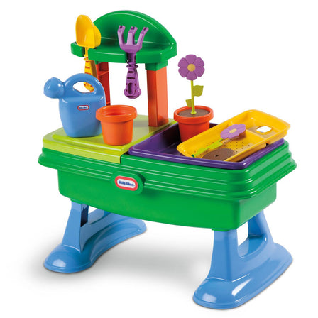 Garden Table - 
Garden set includes 12 accessories perfect for imaginary play.