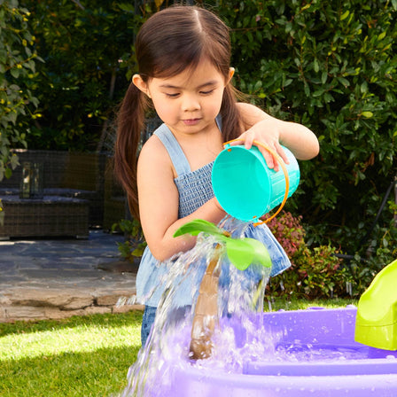 Mermaid Island Wavemaker™ Water Table - 
The palm tree tops twirl with water, wind or by hand.