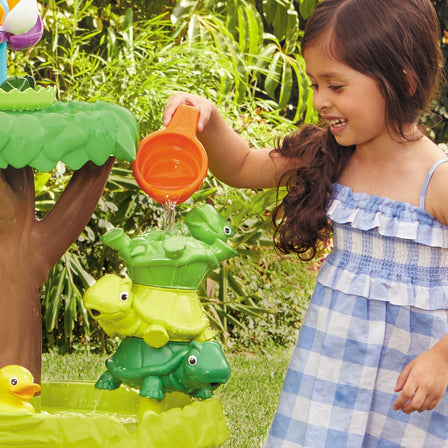 Magic Flower Water Table™ - 
Pour the water and watch the turtles spin.