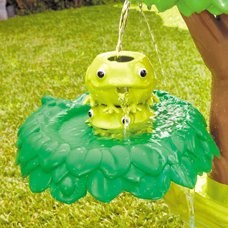 Magic Flower Water Table™ - 
Water flows through the stackable fountain frogs.