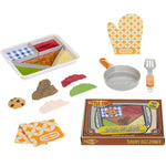 accessories: TV Dinner Box, TV dinner tray, cookie, Salisbury Steak, green beans, mashed potato, pickled beets, frying pan, spatula, kitchen towel and an oven mitt