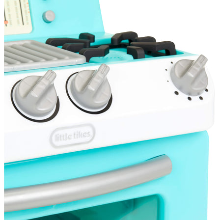 First Retro Oven - 
Turn the dial to hear cooking sounds like burners igniting, water boiling, sizzling and more.