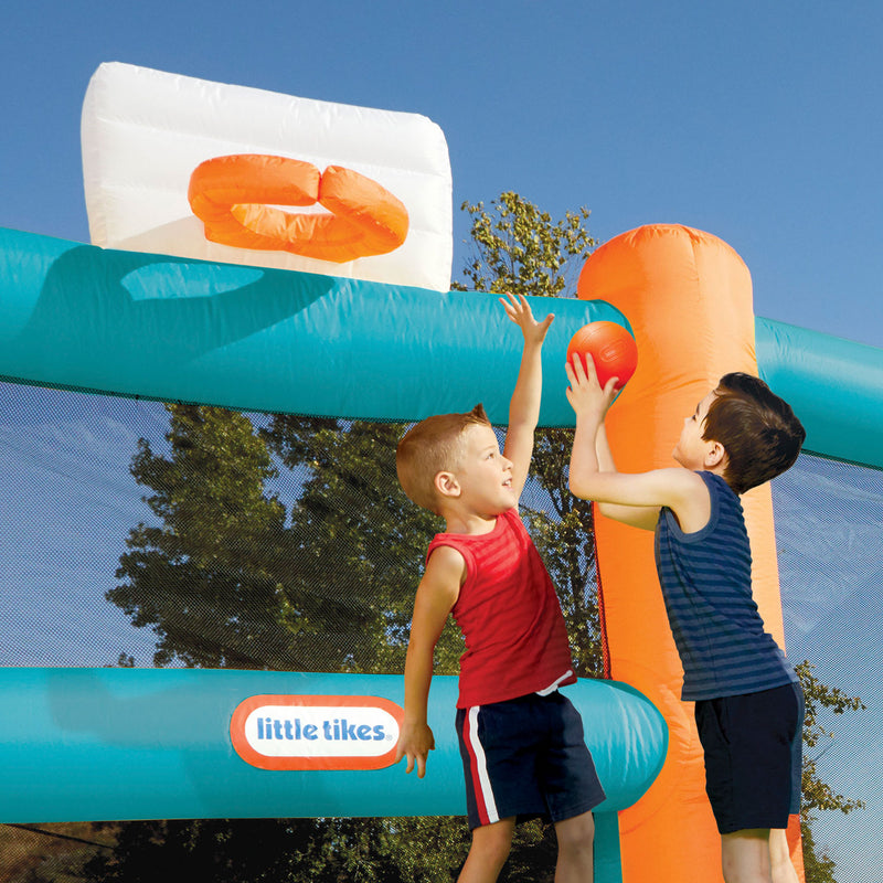 Kids can play a game of basketball with hoops at both ends of the court